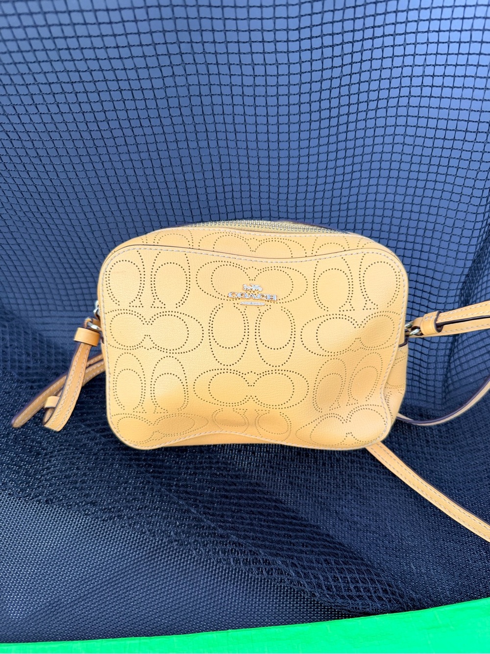 Coach Perforated Signature Crossbody Bag in Yellow